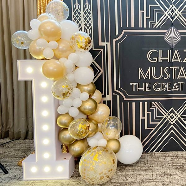 Lighted Marquee Number and balloon garland the brat shack